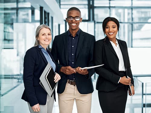 Diverse portrait of businesspeople working together in a modern office.